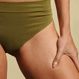 female trimming groin area hair with the Meridian trimmer