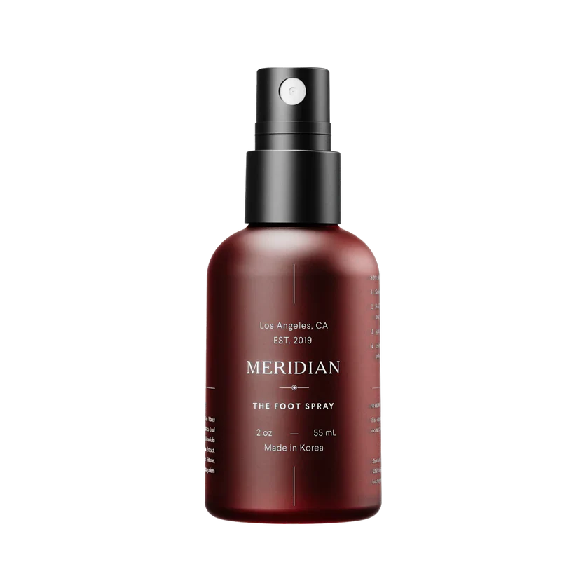 A brown Meridian branded foot spray bottle with a black spray nozzle.