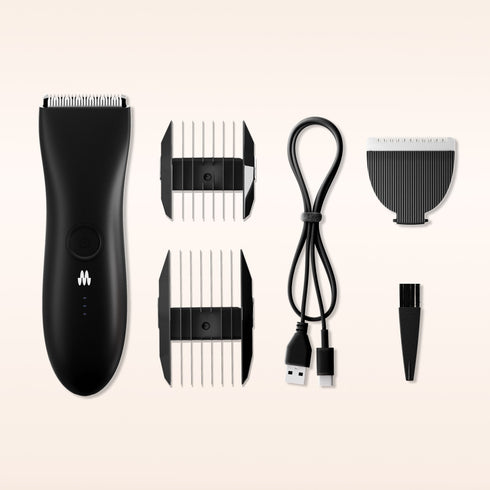Black cordless electric hair trimmer with two clipper guards, USB charging cable, precision blade, and cleaning brush on neutral background.